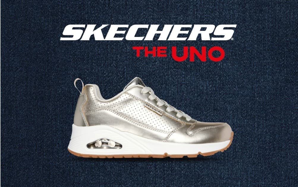 UNO Schuh champagner auf blauem Hintergrund