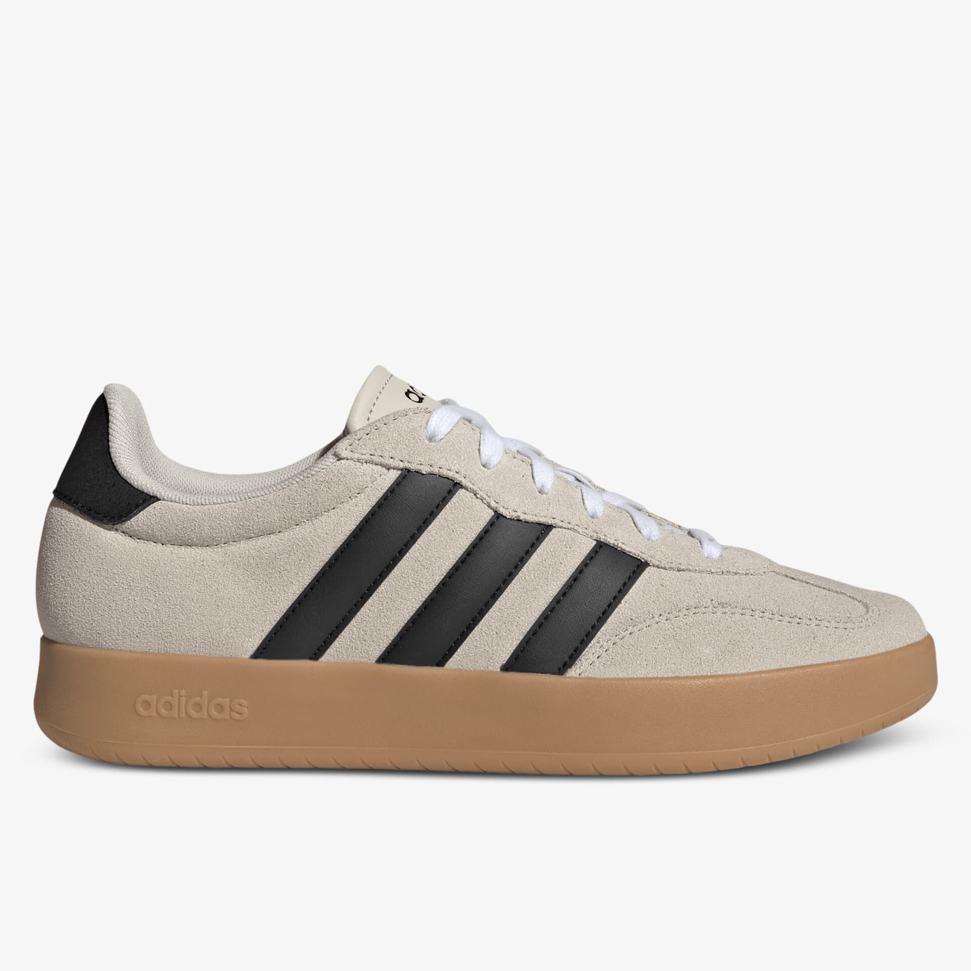 Seitliche Ansicht eines hellbeigen Sneaker mit schwarzen Streifen und brauner Gummisohle