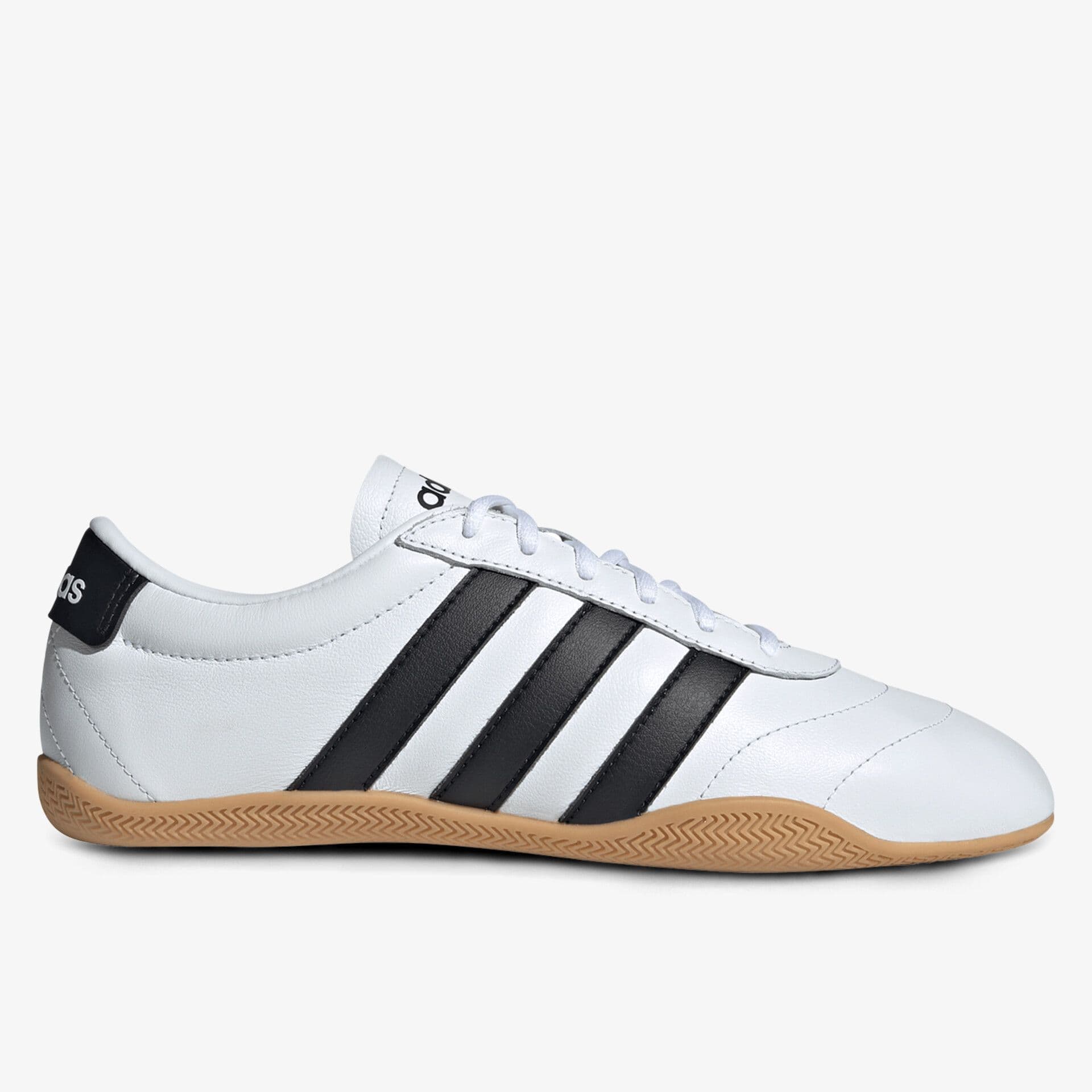 White sneaker with black stripes, gum sole, and a low-top design. Features include laces and branding on the heel and tongue.