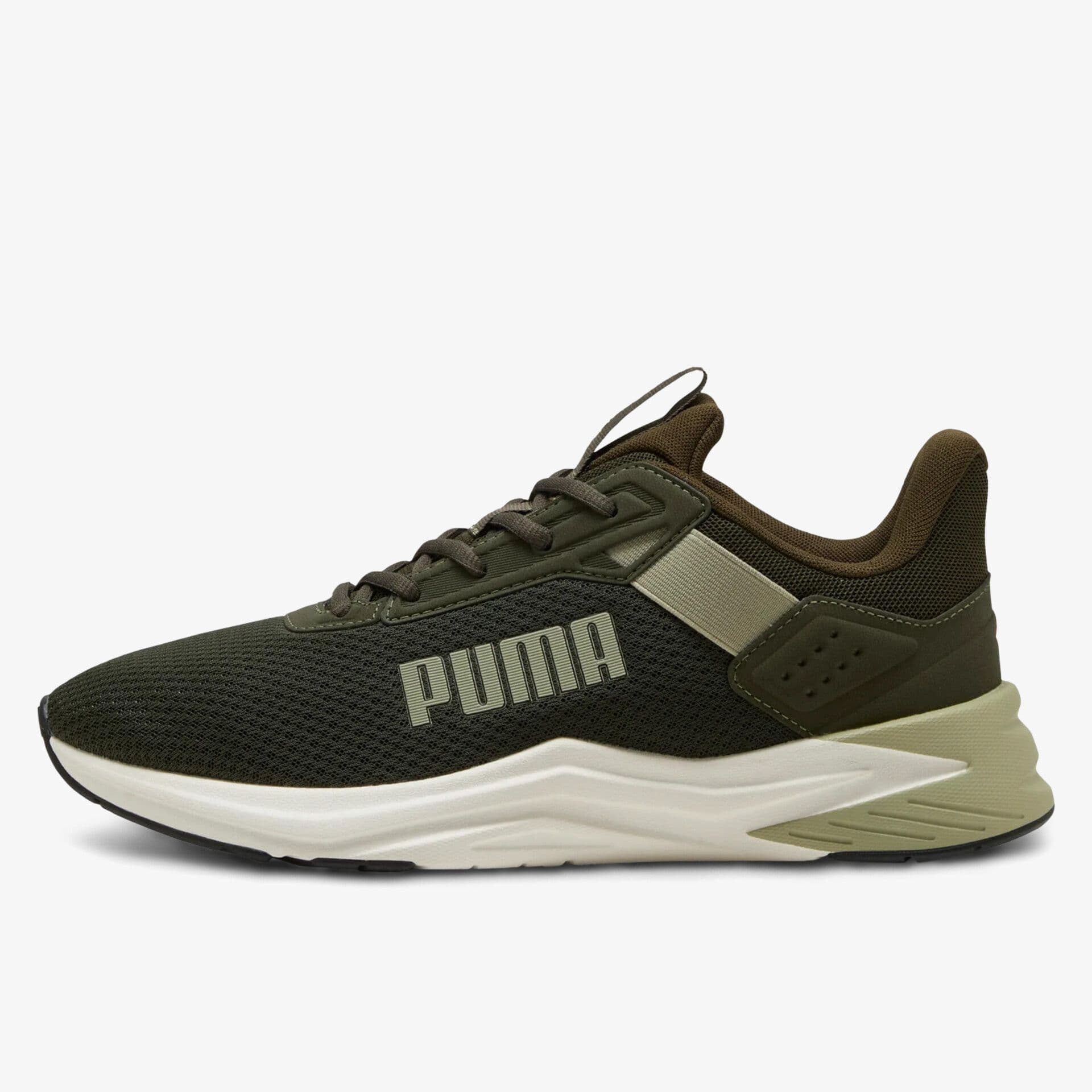 Olive green Puma sneaker with mesh upper, beige accents, and a thick white sole. The Puma logo is prominently displayed on the side.