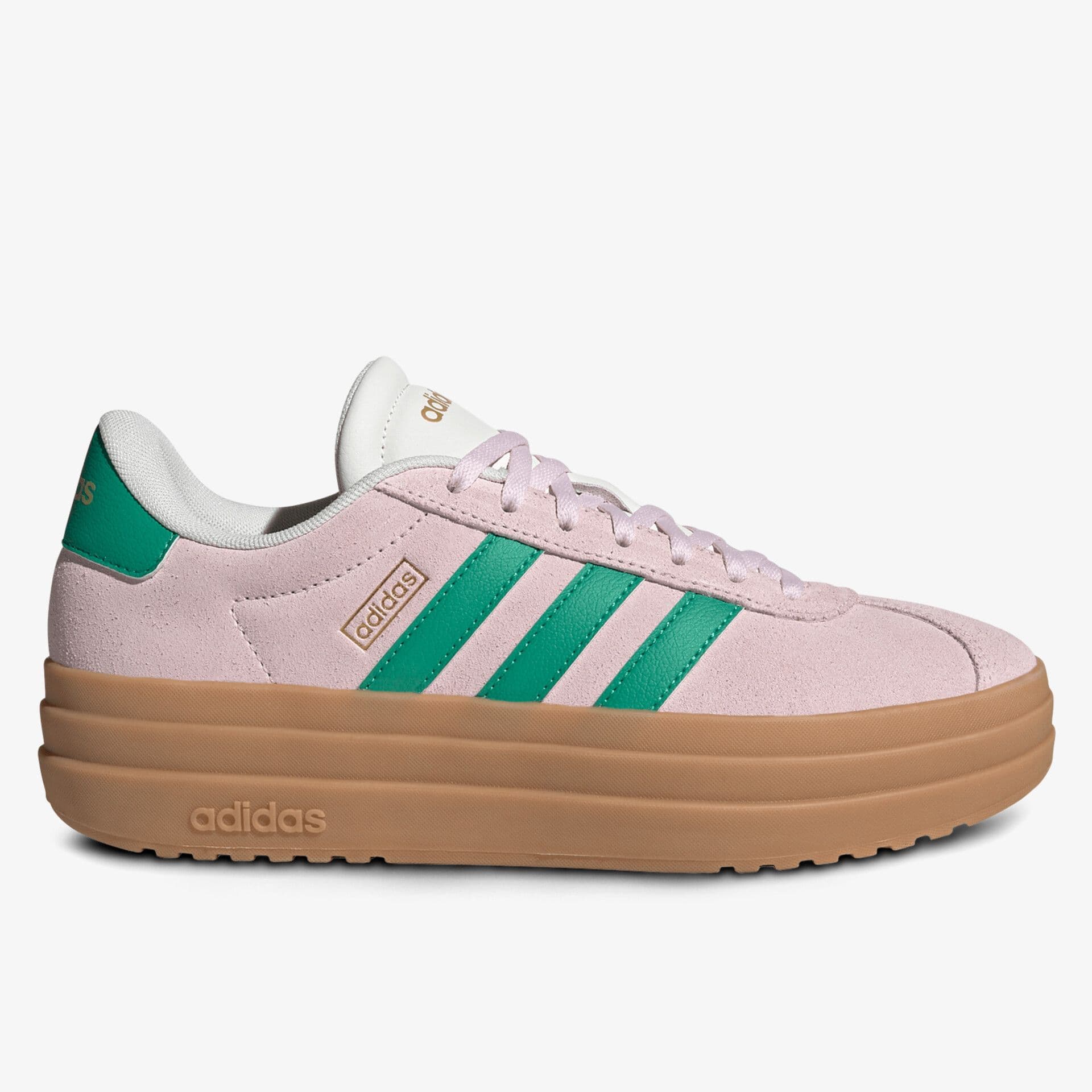 Pink Adidas sneaker with green stripes, white laces, and a thick tan sole. Features a white tongue and branding on the side and heel.