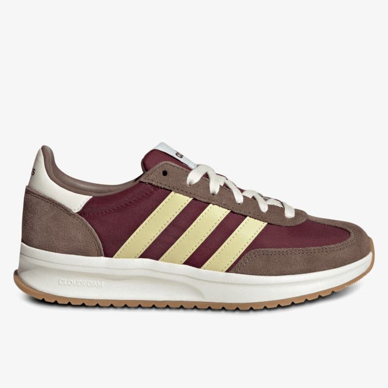 A maroon and beige sneaker with yellow stripes, white laces, and a brown rubber sole on a white background.