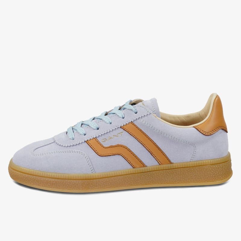 Light gray sneaker with tan details, blue laces, and a gum sole. Features two tan stripes on the side and tan heel accent.